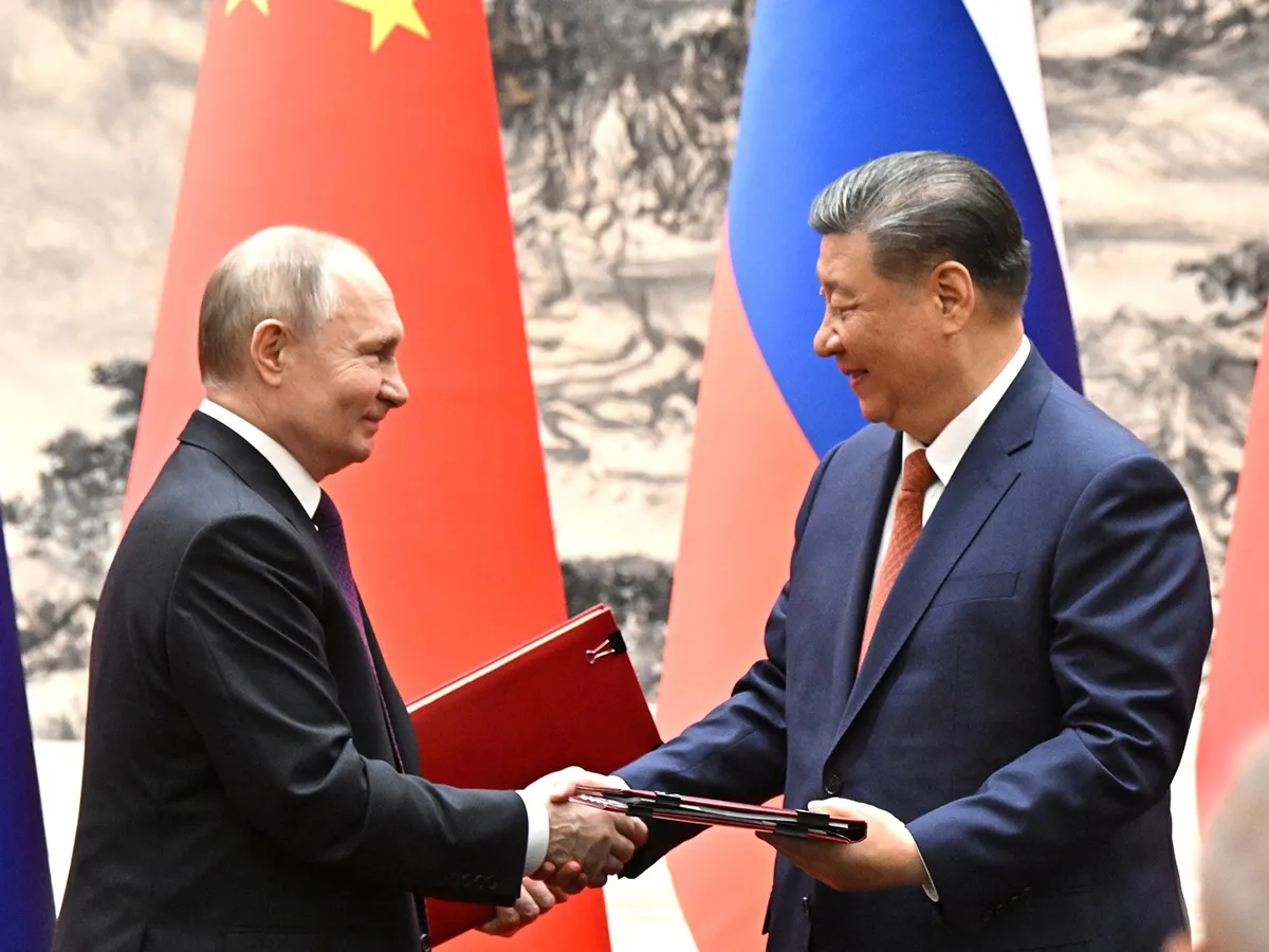 El-presidente-de-la-Republica-Popular-China-Xi-Jinping-y-el-presidente-de-Rusia-Vladimir-Putin